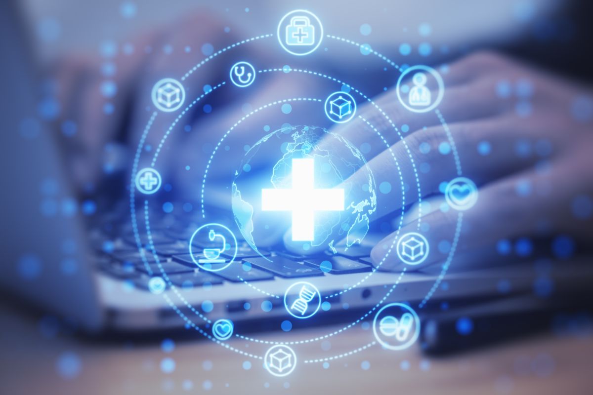 Close,Up,Of,Male,Hands,Using,Laptop,On,Desk,With